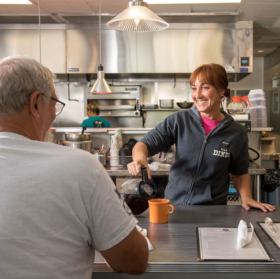 Server pouring coffee for a patron at the best restaurant in Old Hickory, TN