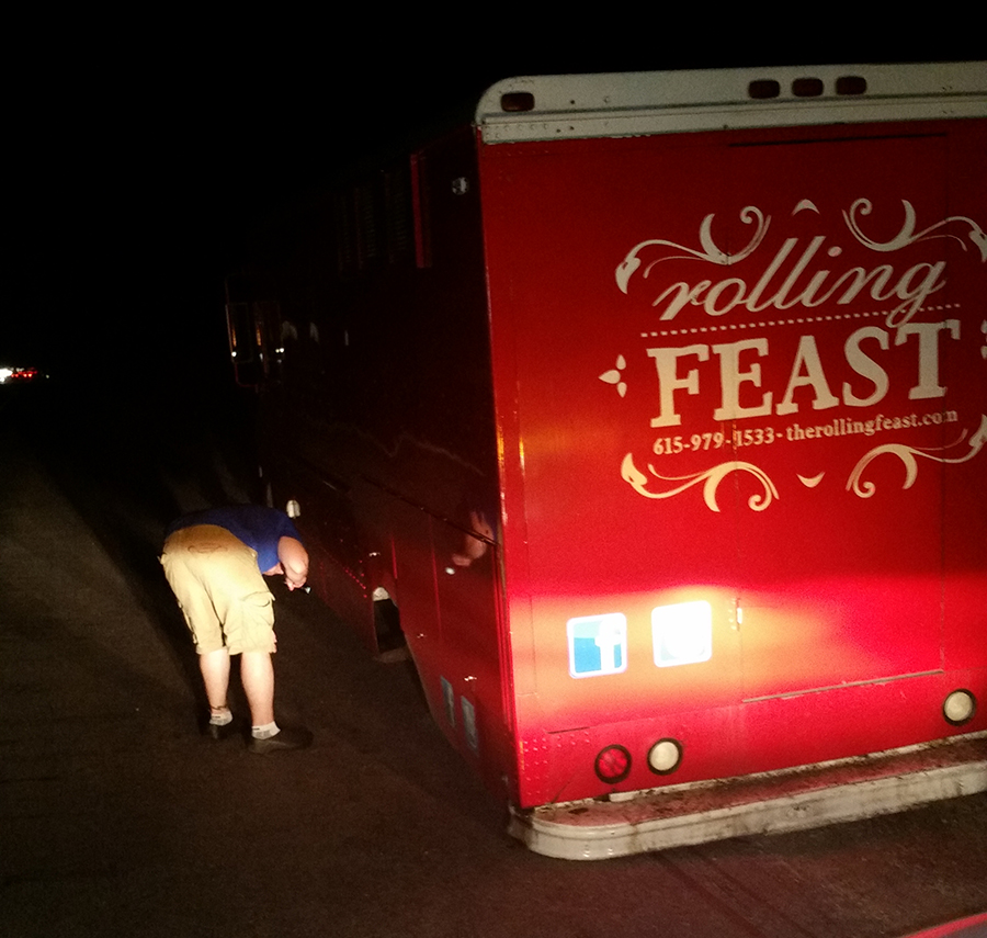 Tom with a broken down food truck on the side of the road before they opened their Nashville diner